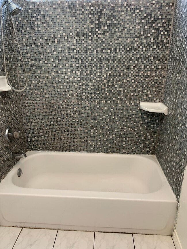 Building Photo - Bright, comfortable, and spacious one bedroom Condominium