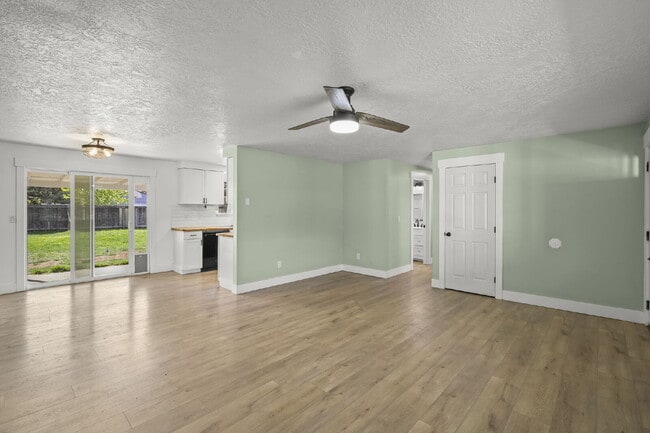 Building Photo - Charming 3-Bedroom Bend Home on 1/2 Acre with Expansive Yard, Mature Trees & Covered RV/Boat Storage