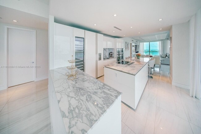 Building Photo - 10203 Collins Ave