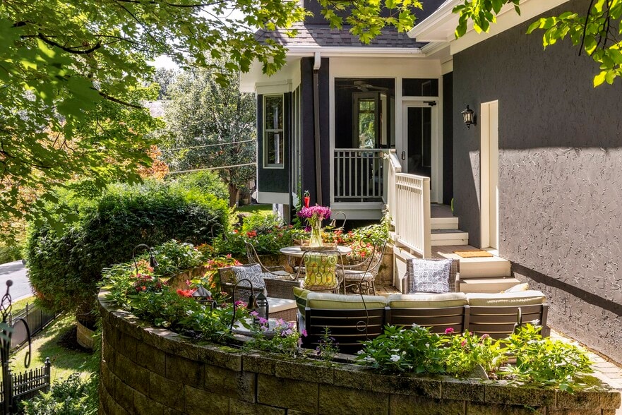 Discover the beauty of lush gardens and ample outdoor space - 745 Rice St E