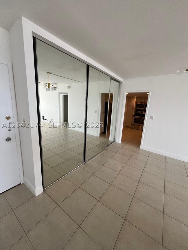 Building Photo - 5005 Collins Ave