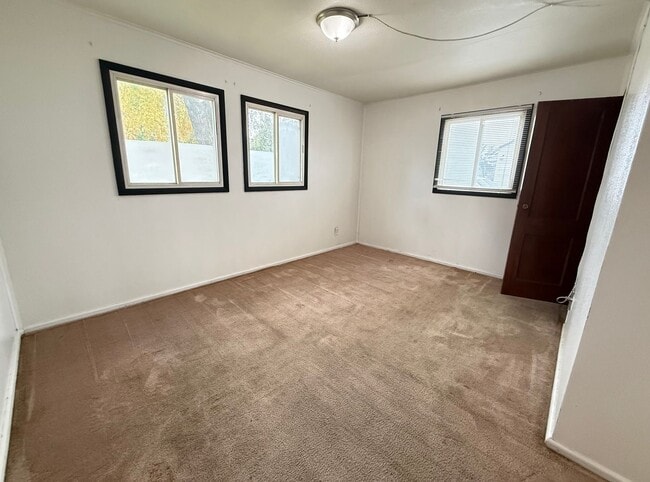 Building Photo - Cozy Main-Floor Living with Garage & Yard