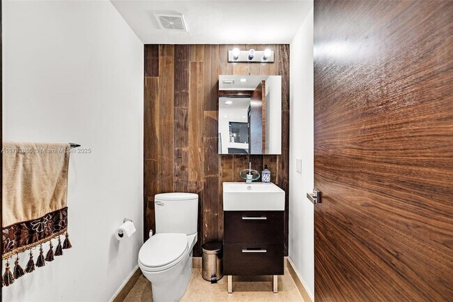 Building Photo - 5875 Collins Ave