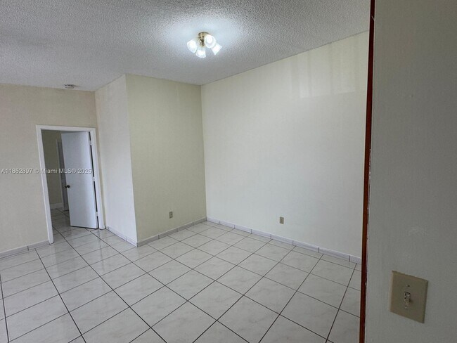 Building Photo - 9707 Hammocks Blvd