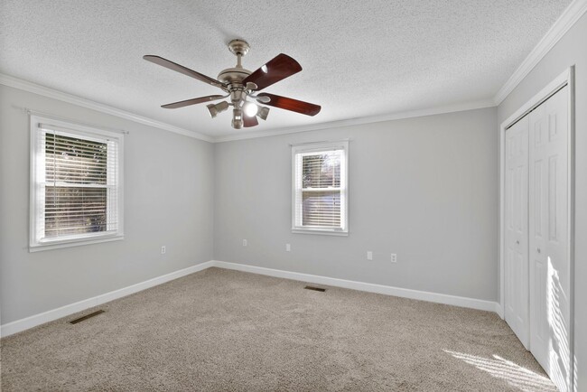 Building Photo - Welcome to this Comfortable, Charming & Outdoor Living, Single-Level Home