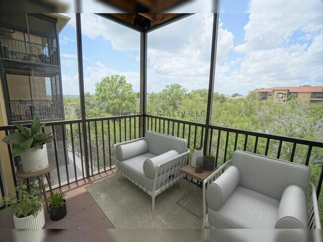 Building Photo - Beach Walk Condo | 2BR/2BA with Bay Views