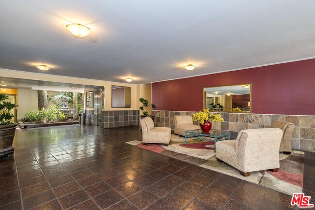 Building Photo - 1230 N Sweetzer Ave