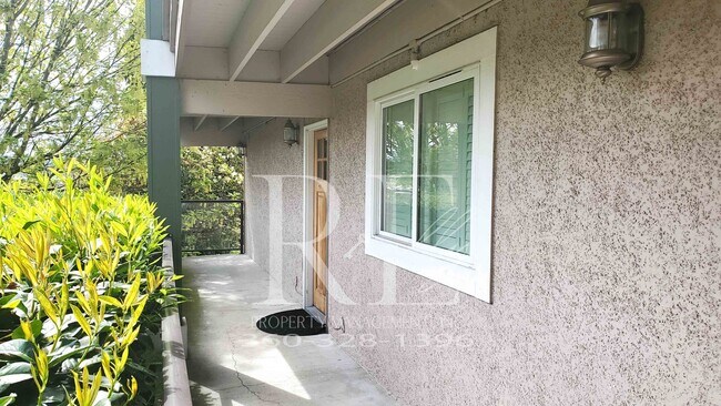 Building Photo - Modern Manette 1BR Condo with Private Pati...