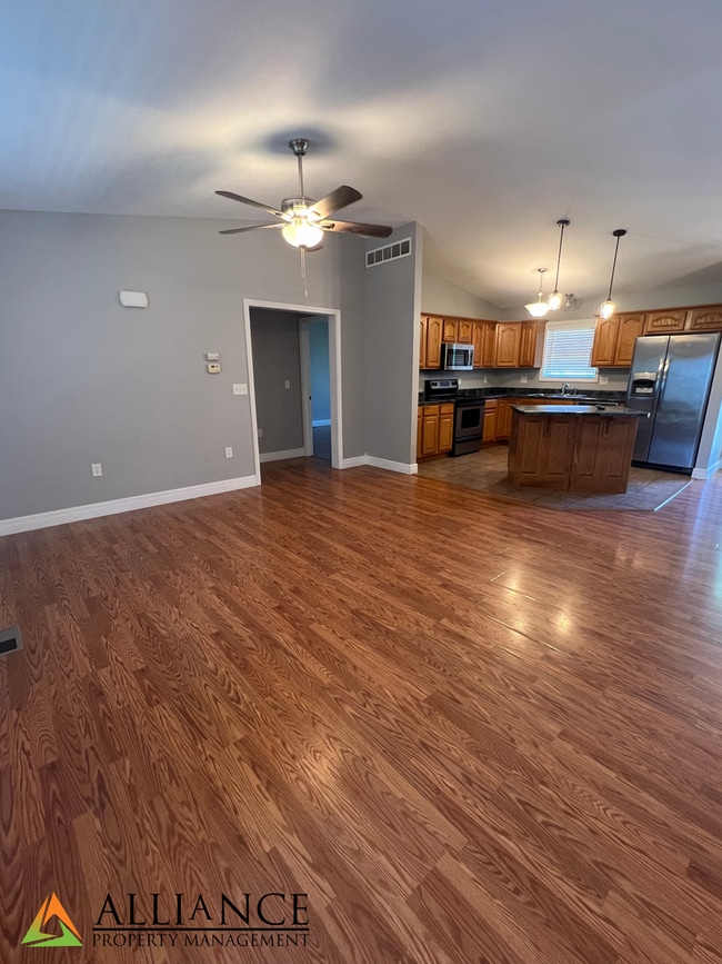 Building Photo - NEWLY PAINTED! Walk Out Basement & Much, Much More!