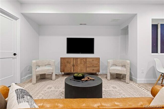 Building Photo - Modern 3-Story Townhomes with Private Yard...