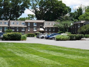 Building Photo - One Bedroom Condo located in Gardens At Owings Mills! - RENT SPECIAL 1/2 off Second Month's Rent