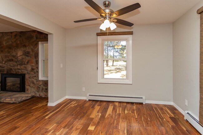 Building Photo - Spacious Country Retreat on 5.5 Acres | Barn, Deck & Pikes Peak View!!