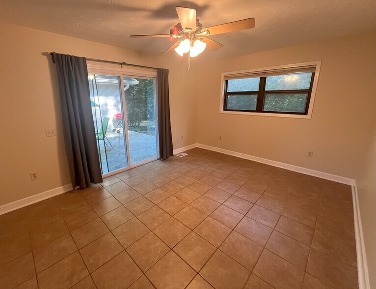 Den opens to private patio - 1405 Southland Vista Ct NE
