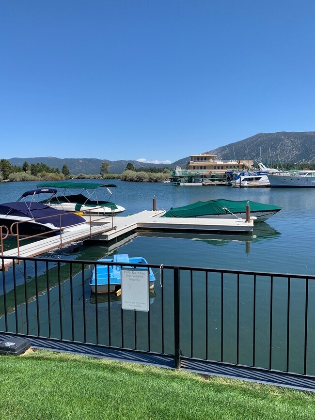 Building Photo - Secure your boat dock before summer!  Unfurnished 3 bed, 2 bath condo with marina and mountain vi...