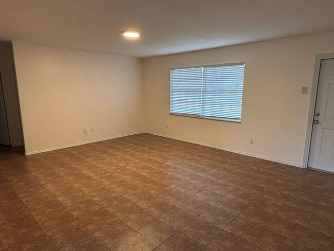 Building Photo - 2/2/1 home with a spacious fenced backyard...