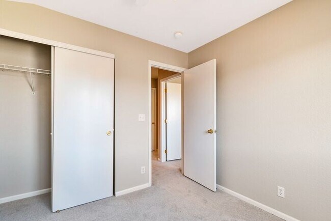 Building Photo - 3BR Townhome Near DIA & Light Rail | New Carpet, Garage & Fenced Patio