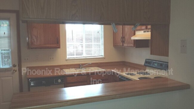 Building Photo - 1008A Milo Cir.