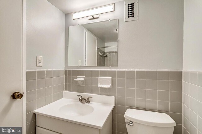 Building Photo - Welcome to The Towers!! This gem of a studio is nestled in a quiet neighborhood in Wesley Heights.