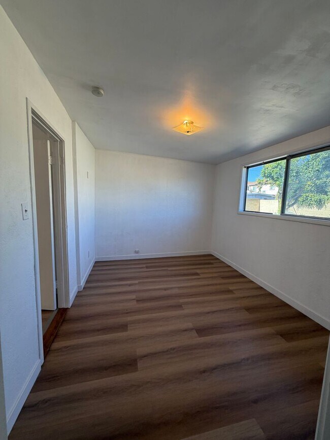 Building Photo - 10031 Larson Ave