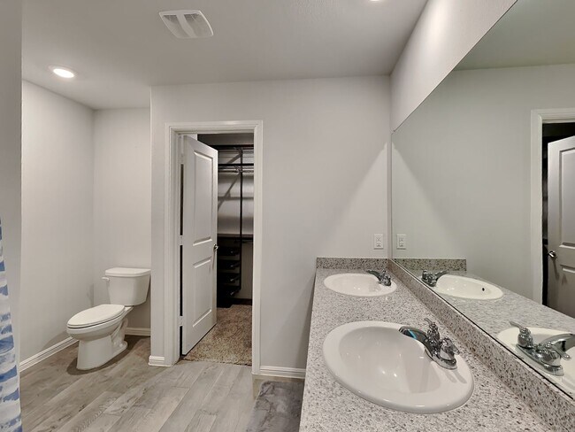 Building Photo - Chapel Creek Beauty with Designer Kitchen, Spacious Layout & Private Backyard Retreat!