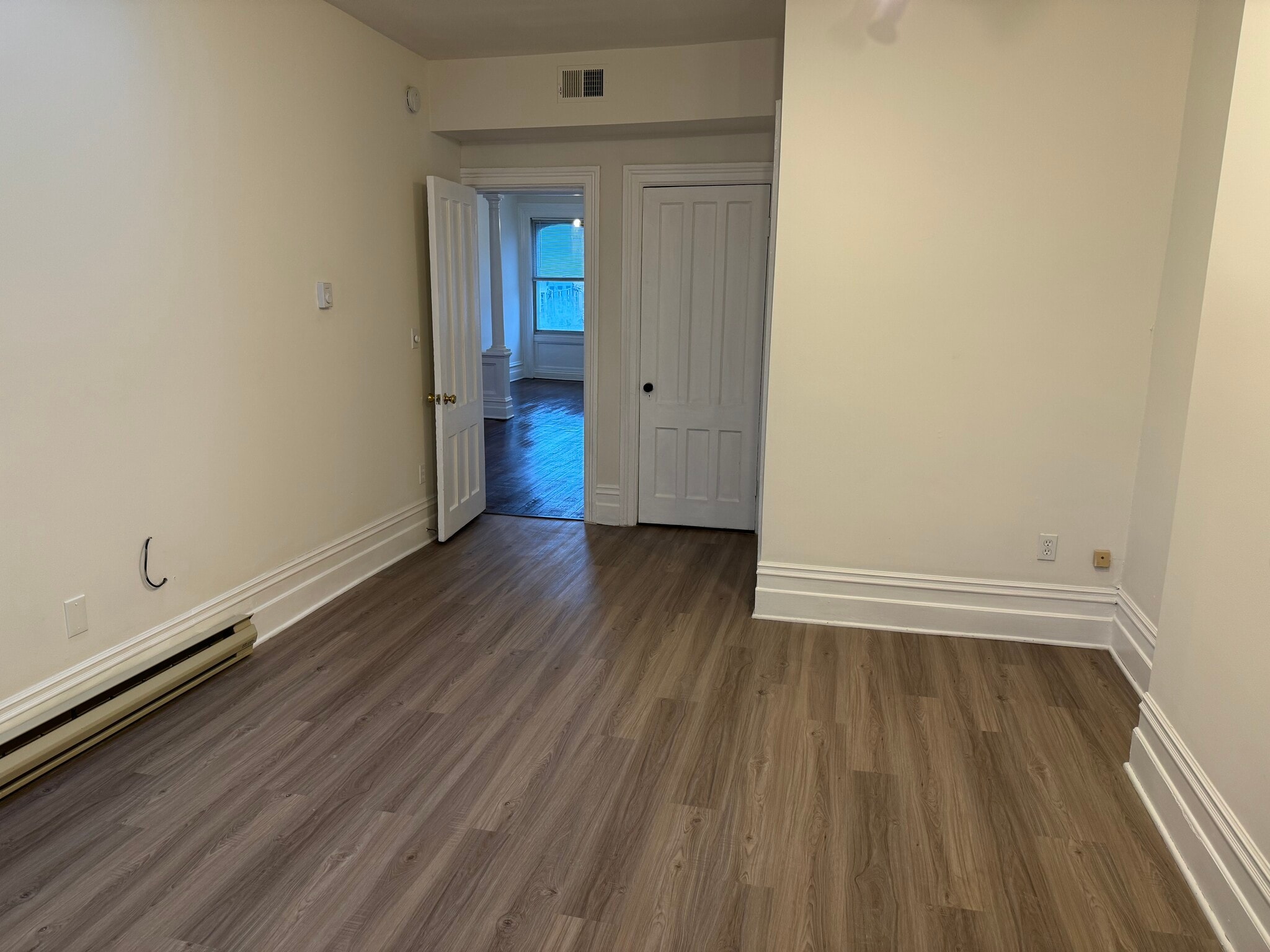 laminate flooring in bedroom area - 118 Philip St