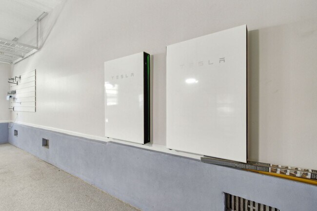 Building Photo - Coastal Luxury Meets Modern Efficiency – 4...