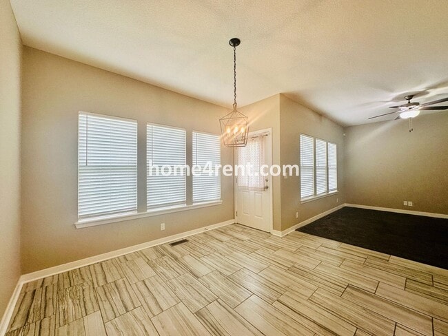 Building Photo - Ranch Style Home w/ Updated Kitchen, including SS Appliances and Granite Counters Plus a Large Un...