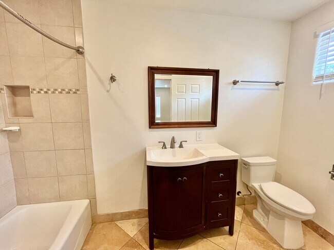 Building Photo - 4BR/3BA Large House - Single Story, No Carpet, AC, Washer/Dryer in Unit, Small Yard, 2 Car Garage...