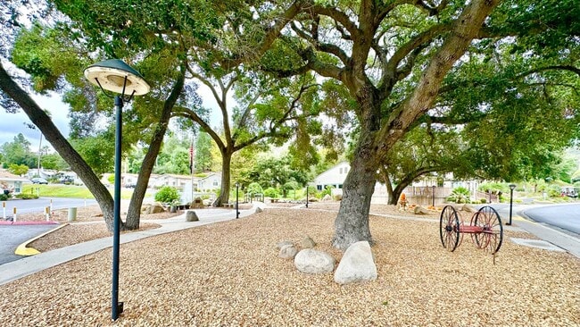 Building Photo - Light, Bright, and Freshly Updated Home in the Gated & Desirable Champagne Village 55+ Community!