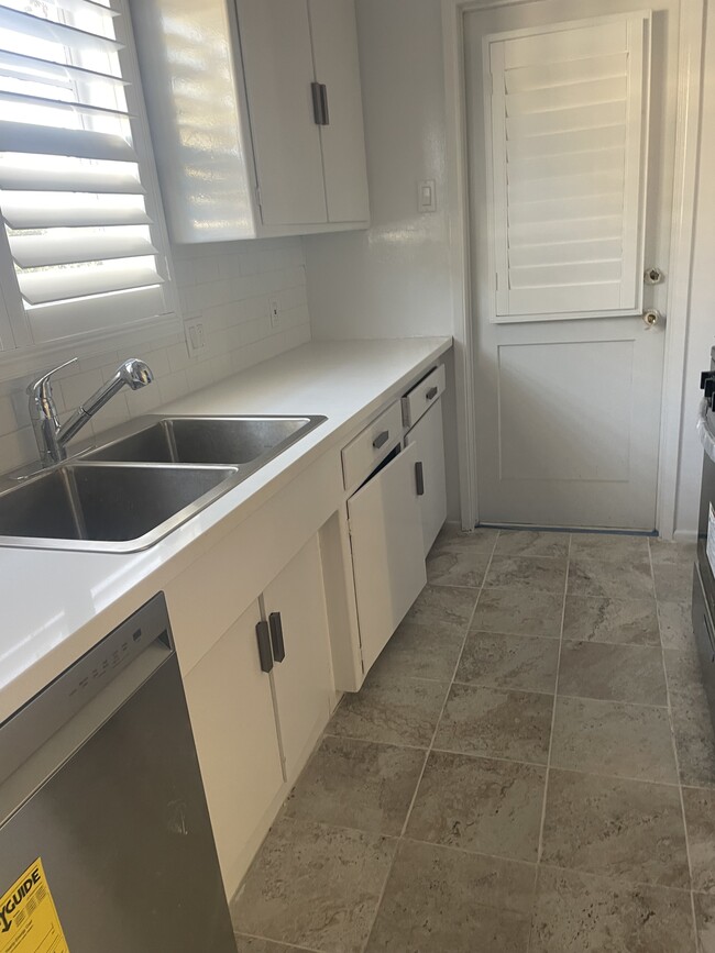 all new kitchen appliances, sink, counter top, floor - 1317 19th St