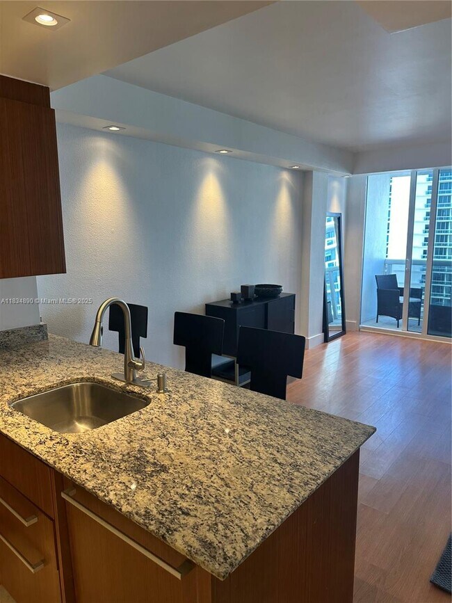 Building Photo - 10275 Collins Ave