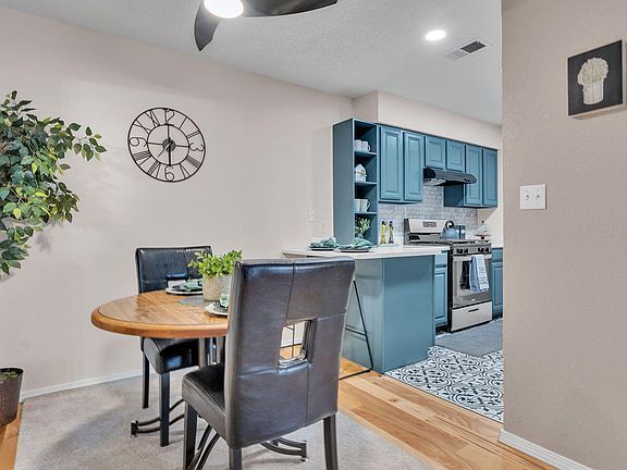 Building Photo - Single-level living at its finest! This co...