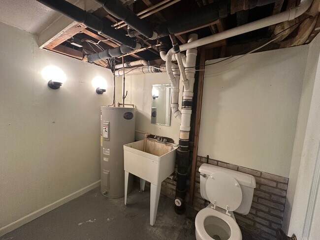 Building Photo - House in Bedford with Lot of Outdoor Space.