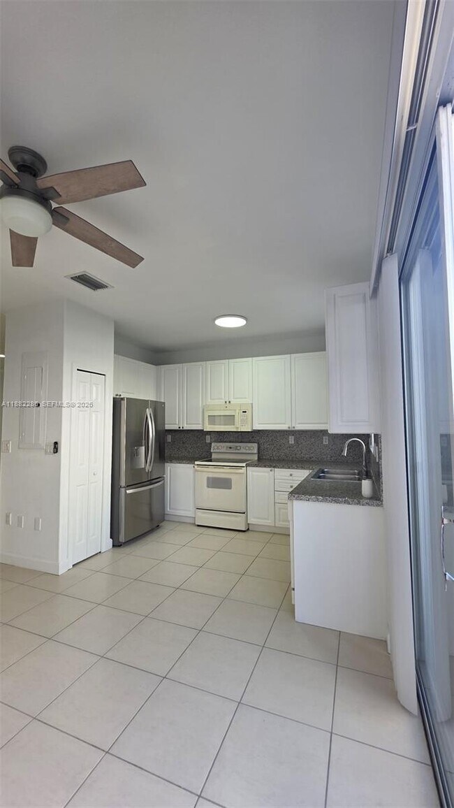 Building Photo - 5570 NW 107th Ave