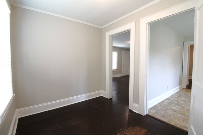 Building Photo - Charming home with updated Kitchen