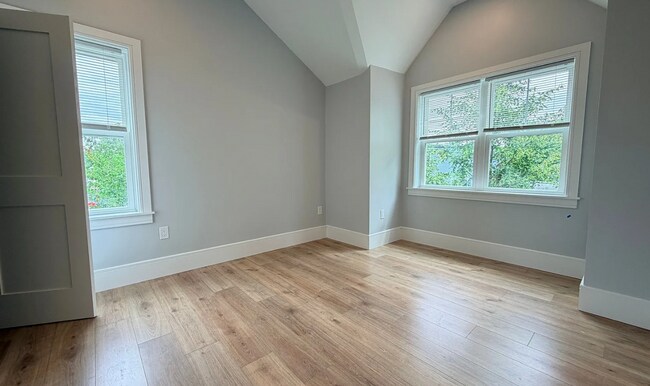 Building Photo - Brand New Construction in Perfect Location!  Laundry in Unit, Centralized Heating and A/C!  Pro M...