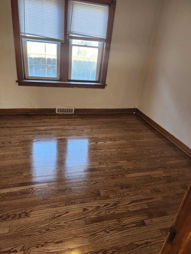 New wood oak floors throughout bedrooms - 4249 Hohman Ave