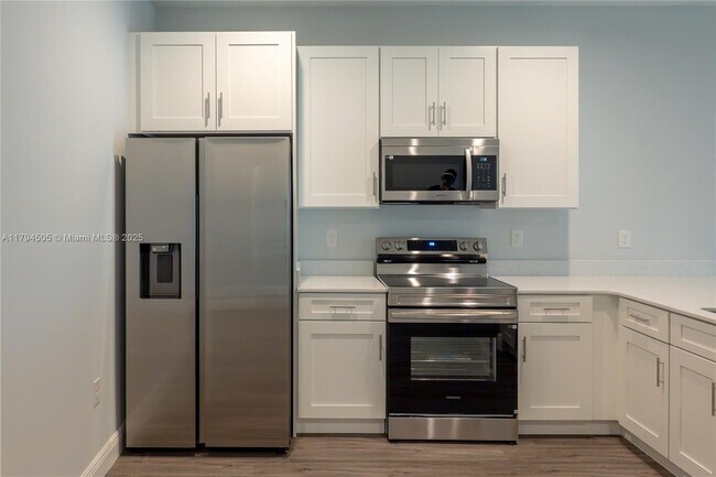 Building Photo - 8448 Dinnano St