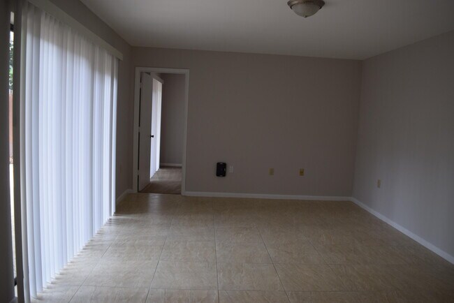 Building Photo - 5945 SE Windsong Ln