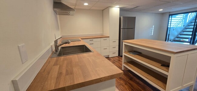 Building Photo - Remodeled 1-Bedroom Lower Unit Home with Private Walkout & Modern Amenities