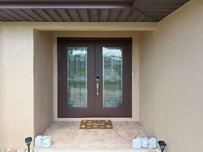 Building Photo - 3 BEDROOM • 2 BATHROOM • PRIVATE POOL • WATERFRONT • BOAT LIFT • ZERO DEPOSIT MOVE-IN AVAILABLE