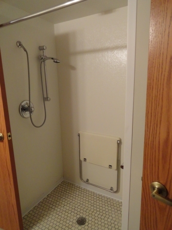 shower with fold down seat - Autumn Place