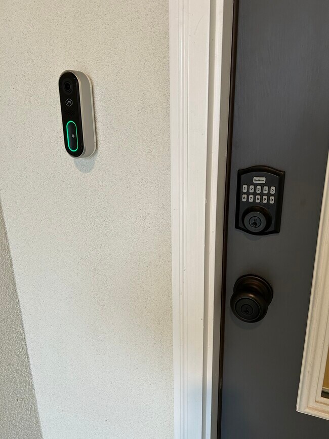 Doorbell camera and keypad door - 7157 Kenilworth Crossing Ave