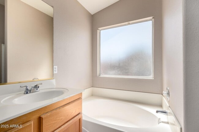 Building Photo - 8375 W Dahlia Dr