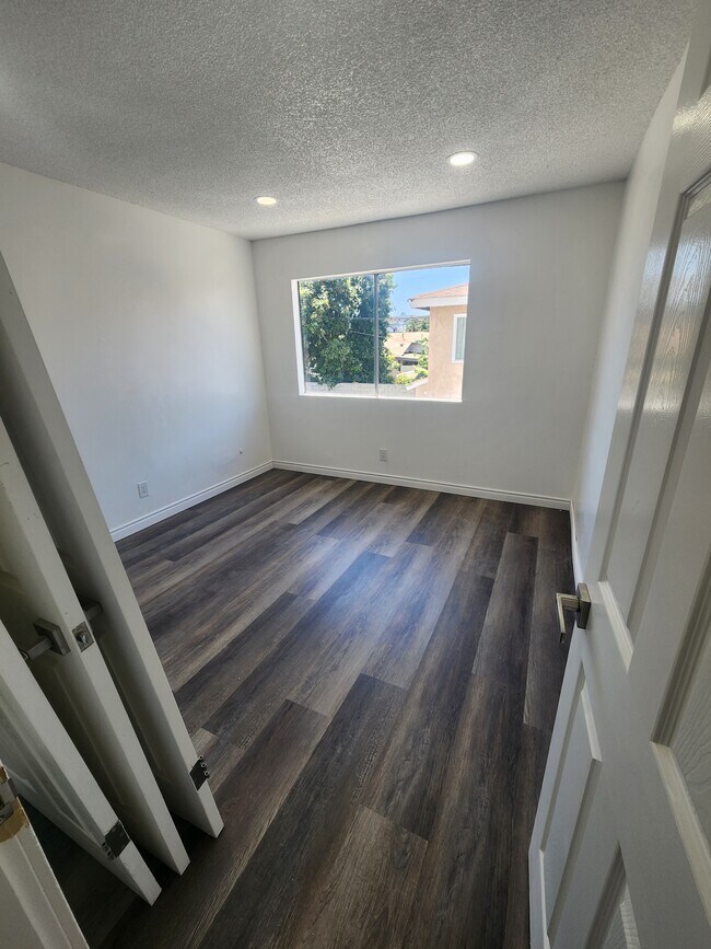 Building Photo - 1451 W 146th St