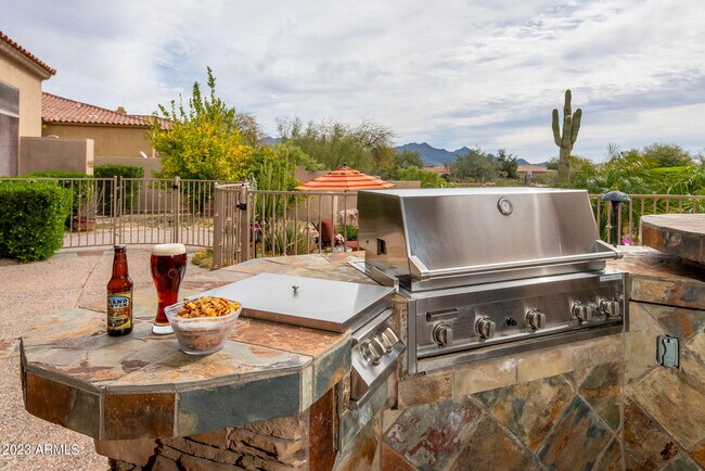 Building Photo - 7895 E Softwind Dr