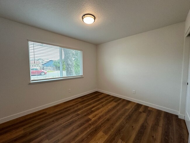Building Photo - Updated Home with Island Kitchen, LVP Flooring, and Yard Care Included!