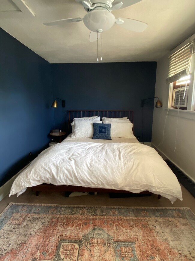 Cozy bedroom, with wall of windows for light, walk-in closet - 340 NE Beyrl Ter