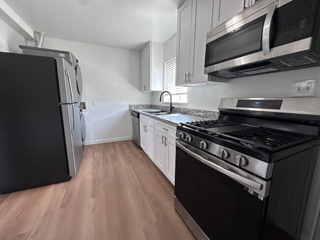 Building Photo - ~Move In Special- $500 Off One Months Rent~ Newly Remodeled Two-Bedroom Condo! Rent Includes Wate...