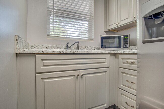 Building Photo - Updated 3-Bedroom, 2-Bath Ranch with Fenced Backyard, Carport, and Modern Kitchen